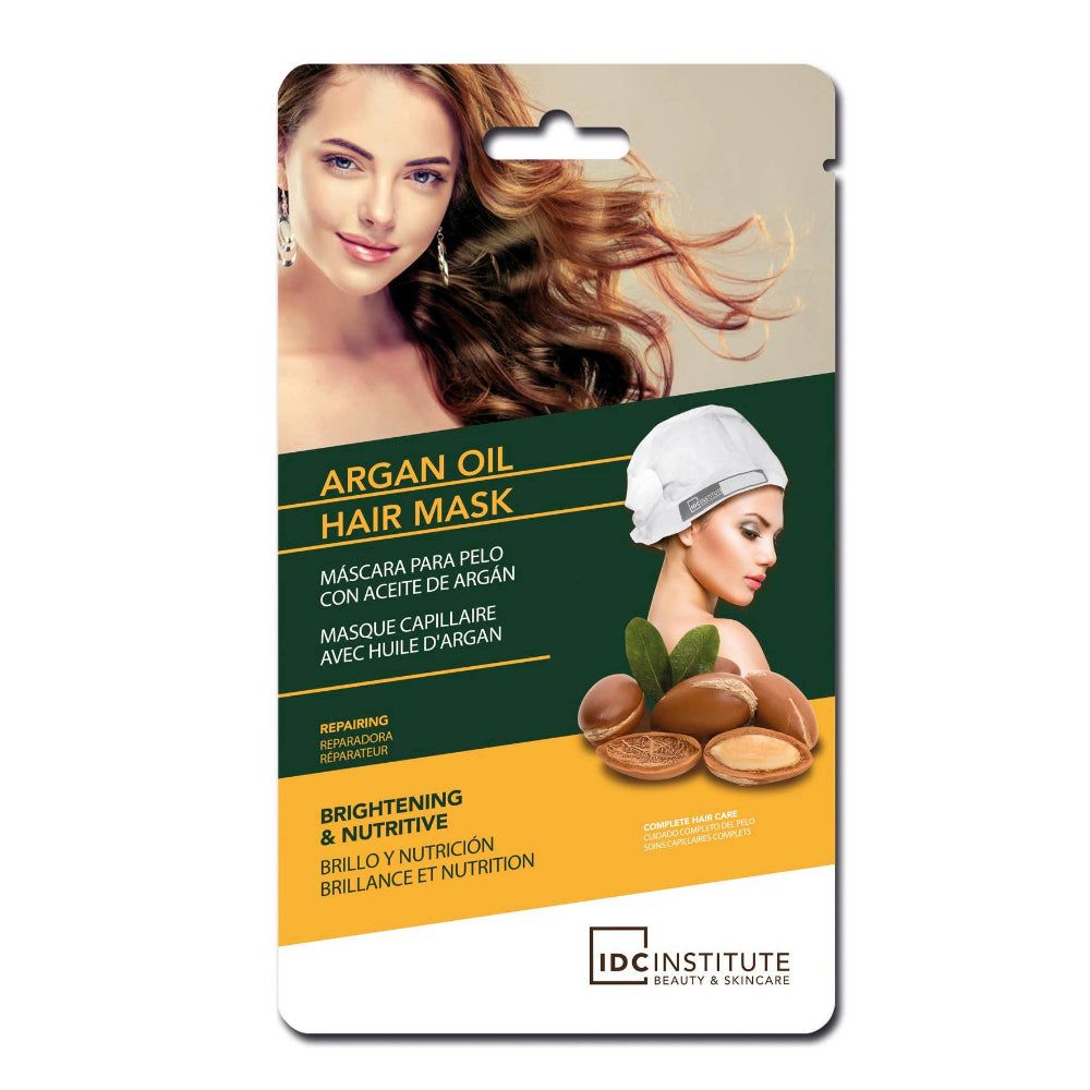 Verpackung für eine Haarmaske mit einer Frau, die lange Haare hat, und einer Abbildung der Maske. Text: Argan Oil Hair Mask.