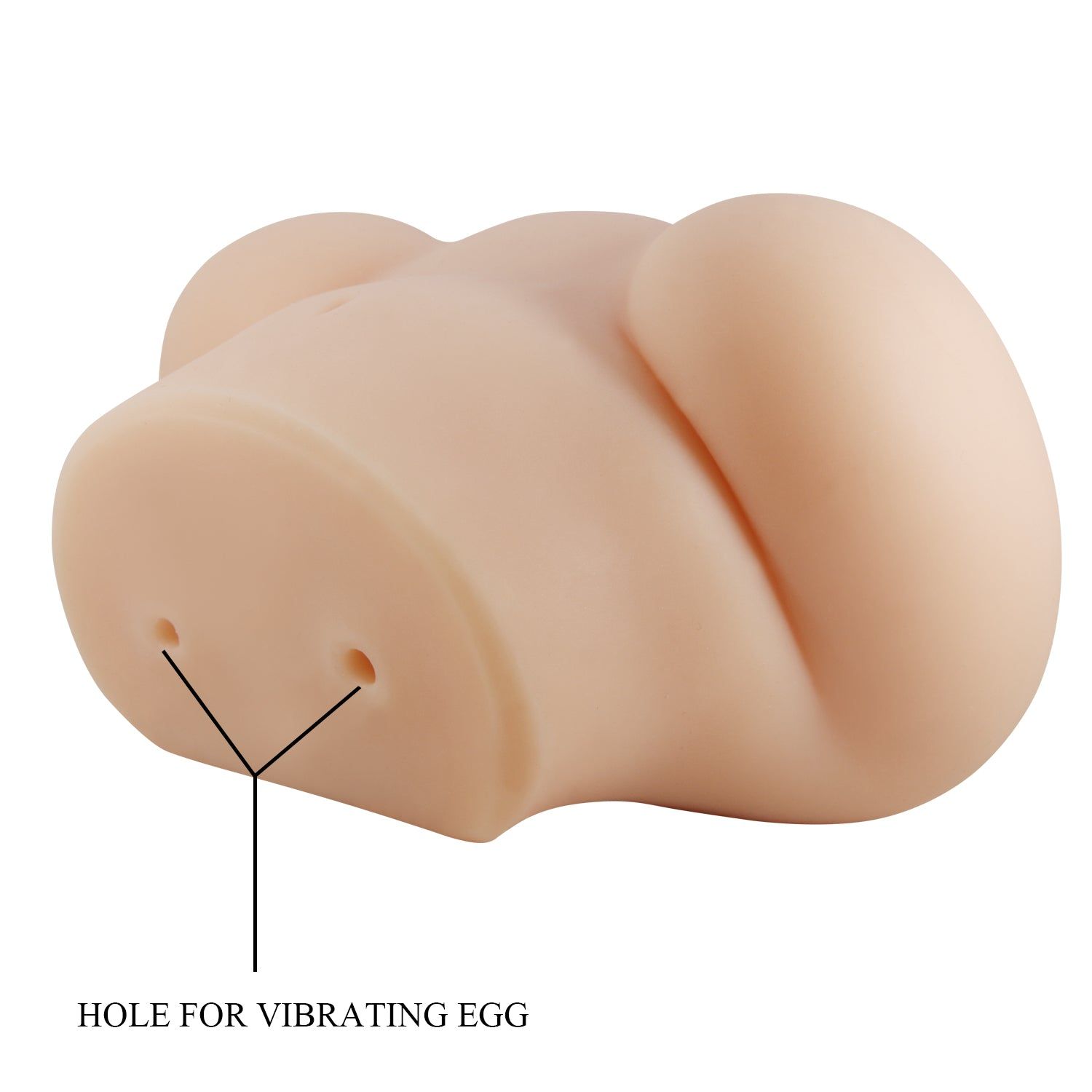 Beiges, anatomisch geformtes Produkt. Zwei Löcher, Beschriftung: 'HOLE FOR VIBRATING EGG'.