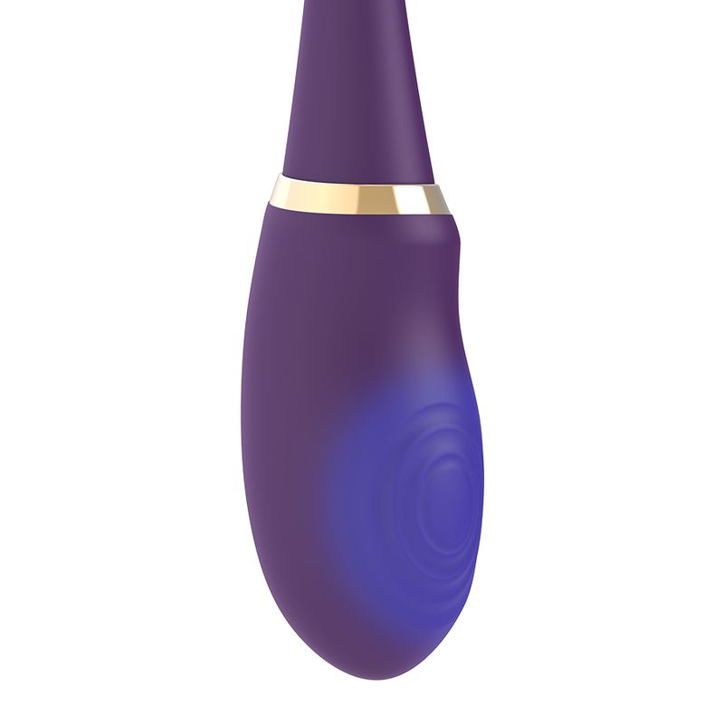 Lila Vibrator mit goldfarbenem Ring. Geriffelte Oberfläche. Abgerundete Form.
