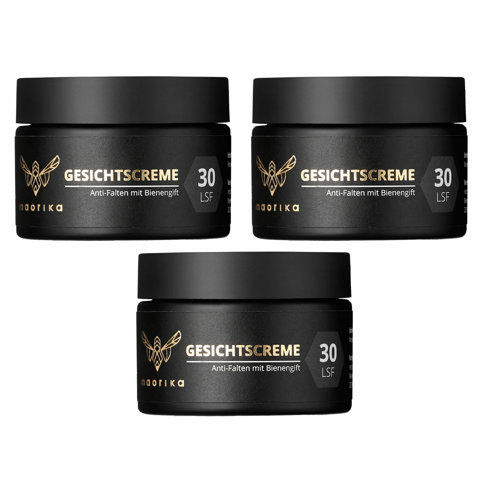 Drei schwarze Tiegel mit goldfarbenem Logo und Schriftzug. Aufschrift: GESICHTSCREME, Anti-Falten mit Bienengift, LSF 30.