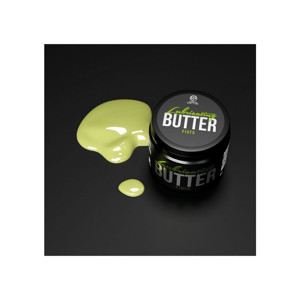 Schwarzer Tiegel mit Deckel und grüne Flüssigkeit daneben. Aufschrift: Lubricating BUTTER, FISTS. Grün und silberne Schrift.