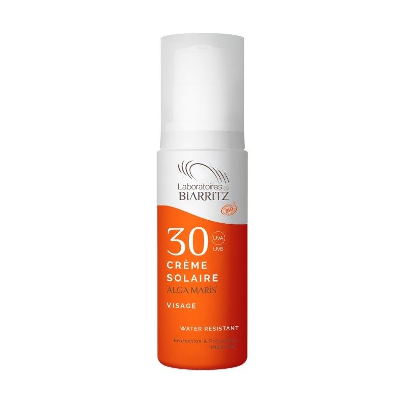 Sonnencreme-Flakon. Weißer Spenderaufsatz, orangefarbener Bereich mit Text: 30, Crème Solaire, Alga Maris, Visage. Marke: Laboratoires de Biarritz.