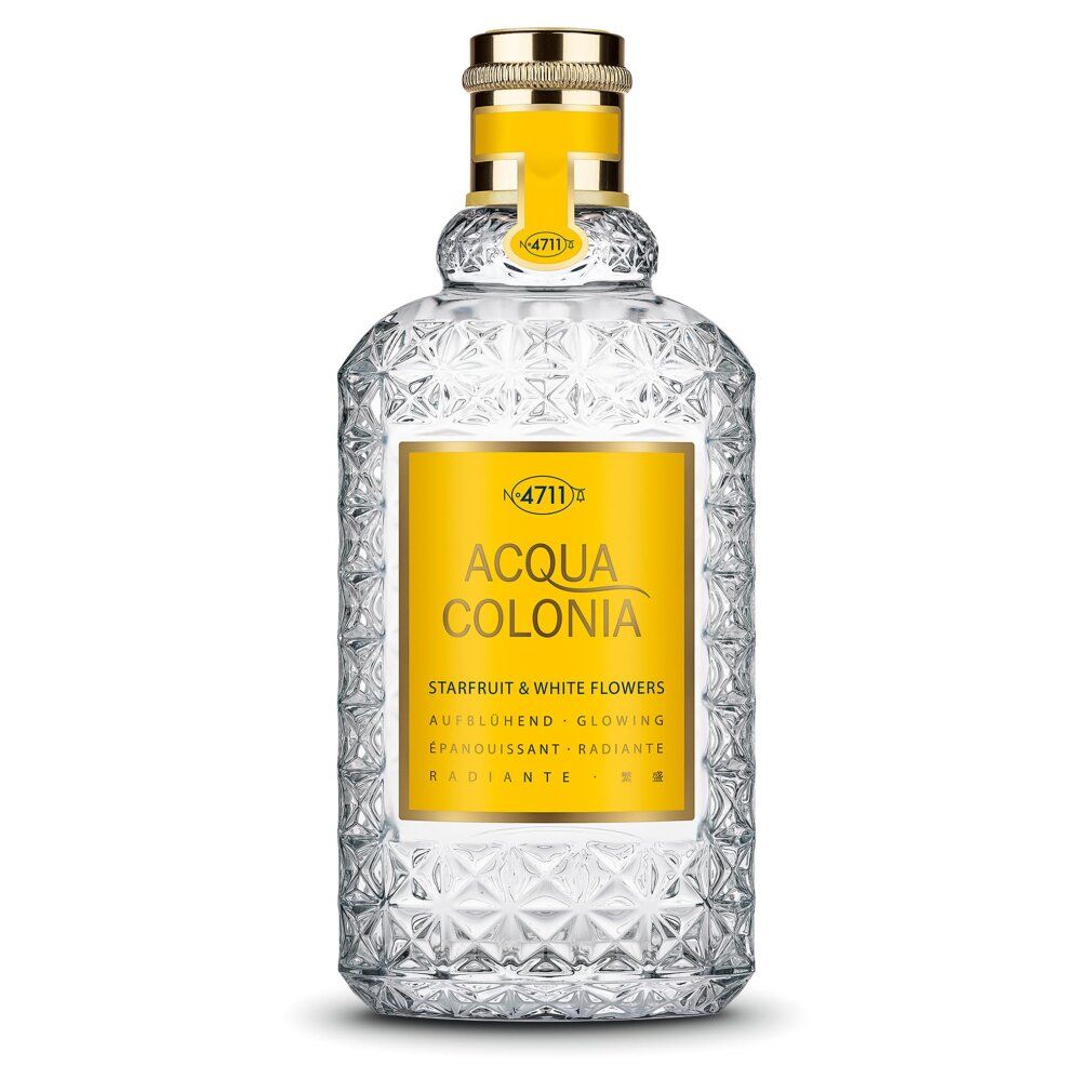 Acqua Colonia Starfruit & White Flowers Flakon mit goldenem Verschluss und gelbem Etikett.