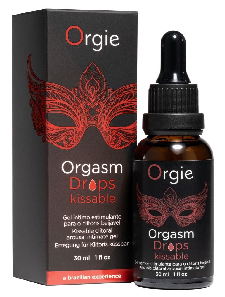 Schwarze Verpackung und Flasche. Rotes Maskenmotiv und Schriftzug "Orgie Orgasm Drops kissable". Flasche mit Pipette, daneben die Verpackung.