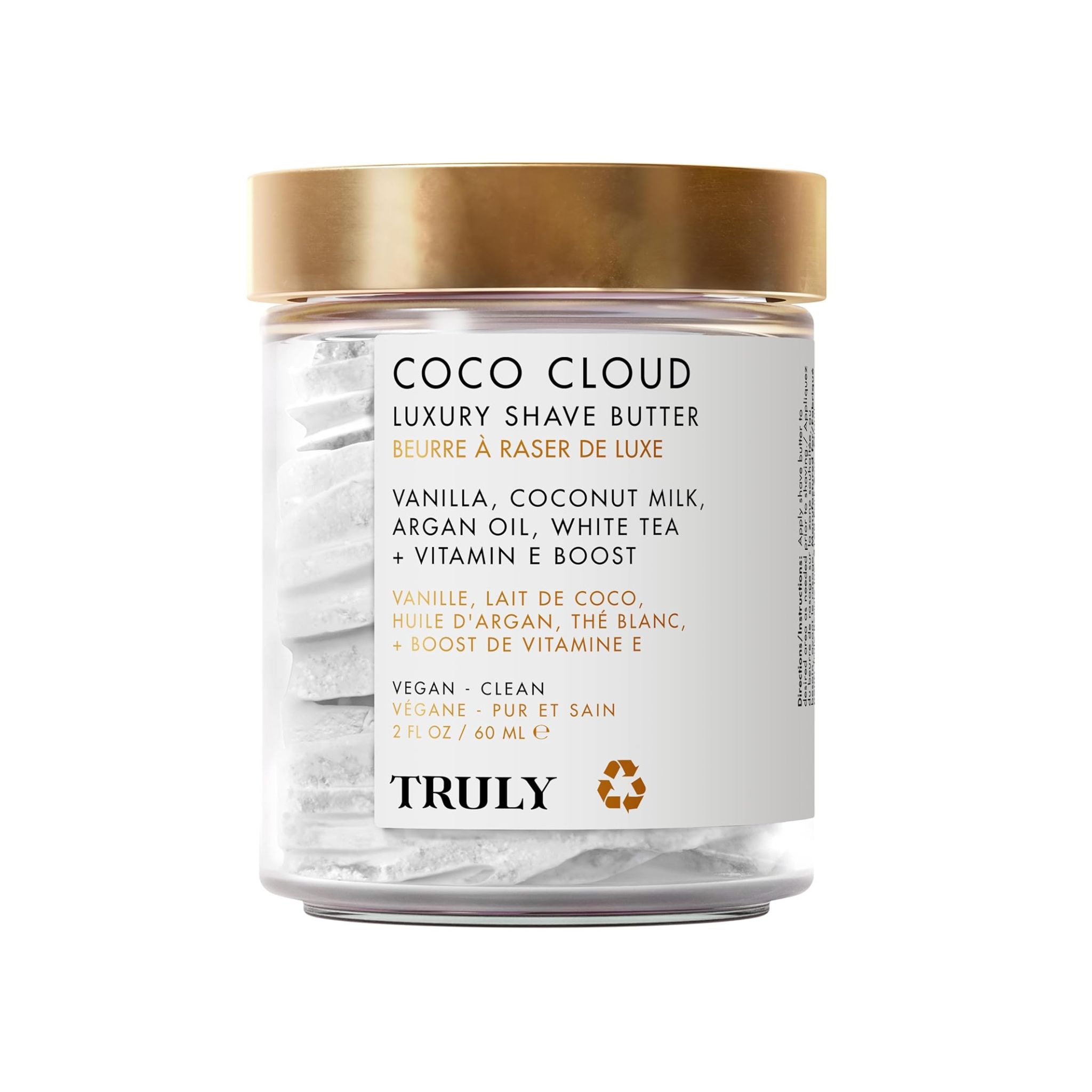 Glasbehälter mit goldfarbenem Deckel. Auf dem Etikett steht "Coco Cloud Luxury Shave Butter". Enthält Vanille, Kokosmilch, Arganöl, weißen Tee und Vitamin E.