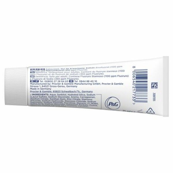 Rückseite einer Zahnpasta-Tube. Enthält Textinformationen und Barcode.