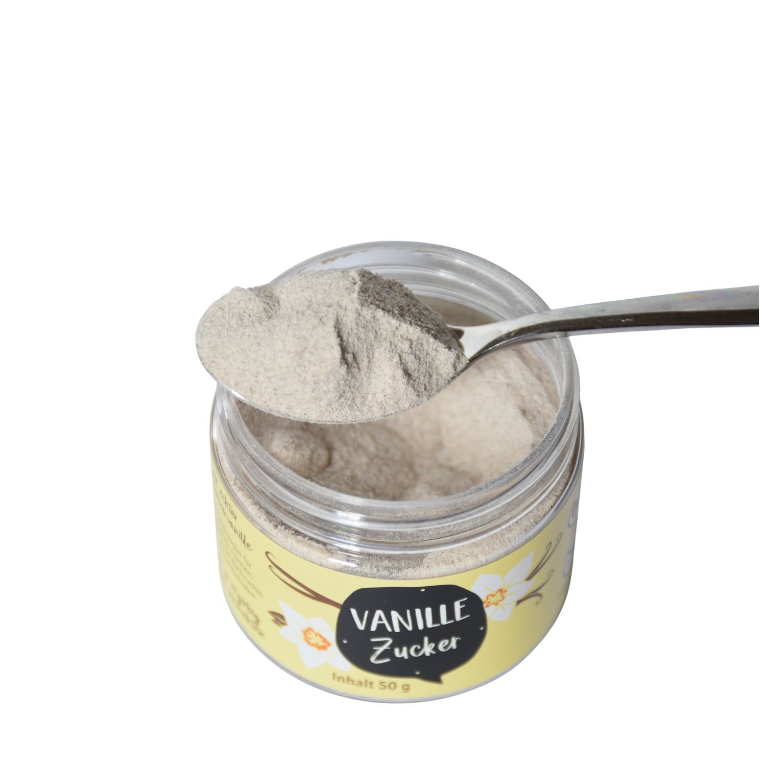 Glas mit Vanillezucker und Löffel. Vanillezucker wird aus dem Glas gelöffelt. Aufschrift Vanille Zucker. Inhalt 50 g.