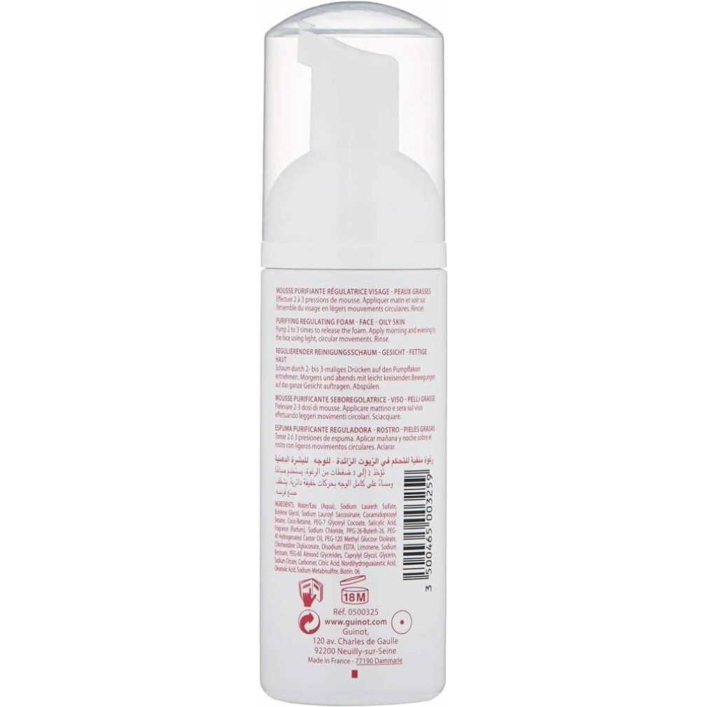 Rückseite einer weißen Flasche mit Sprühkopf. Text in mehreren Sprachen. Guinot Logo. Inhaltsstoffe und Anwendungshinweise.