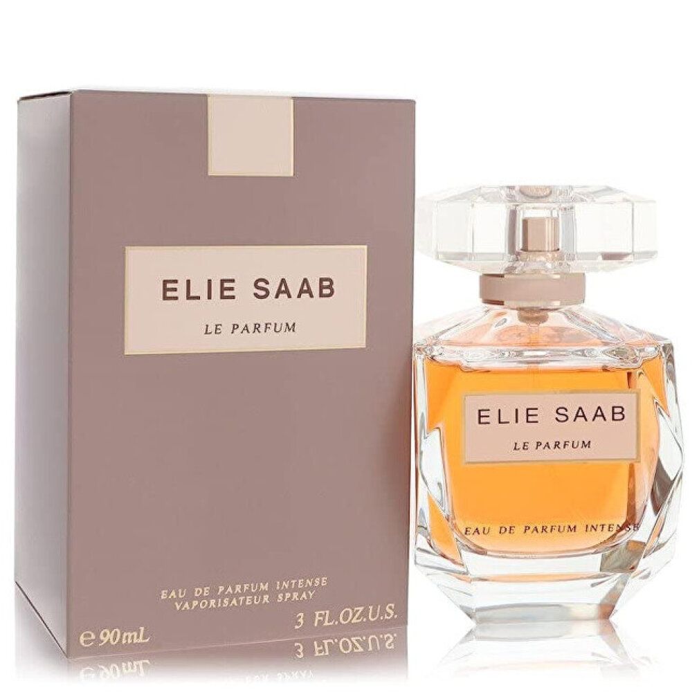 Verpackung und Parfumflakon. Flakon mit ELIE SAAB LE PARFUM. Aufschrift. Flakon mit goldfarbener Flüssigkeit.