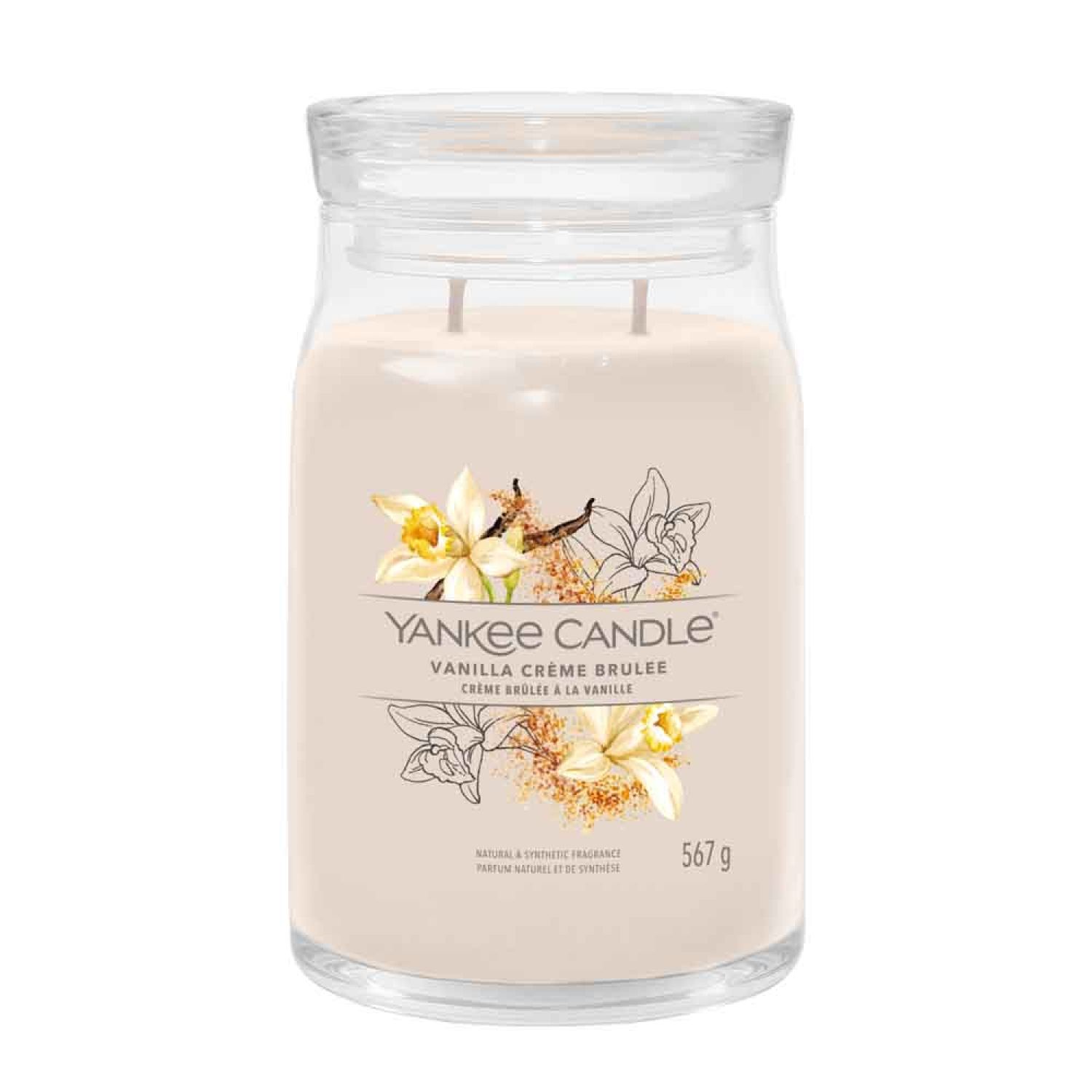Glasbehälter mit Deckel, Kerze mit zwei Dochten. Etikett mit Blumen, Produktname und Gewicht.
