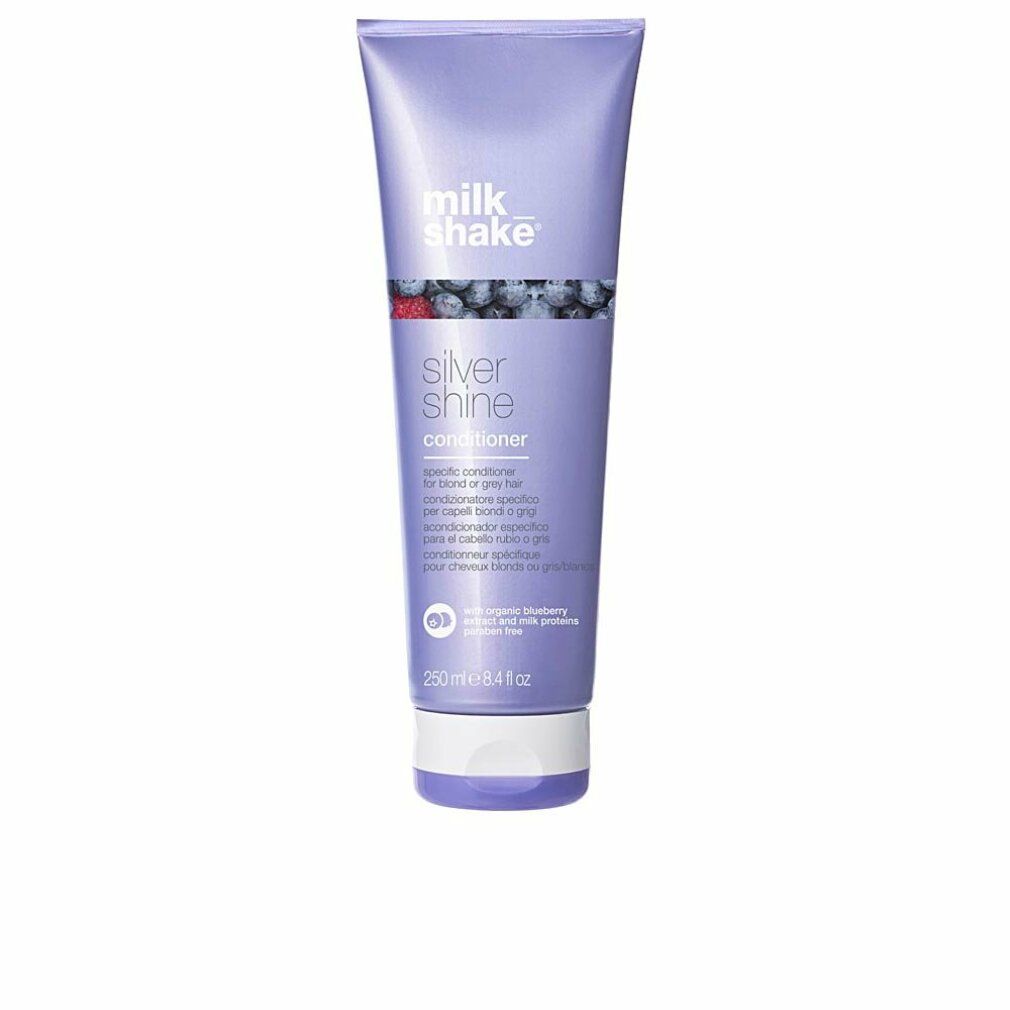 Lila Tube mit Produkt. Aufschrift: milk_shake Silver Shine Conditioner. Mit Blaubeeren-Illustration.