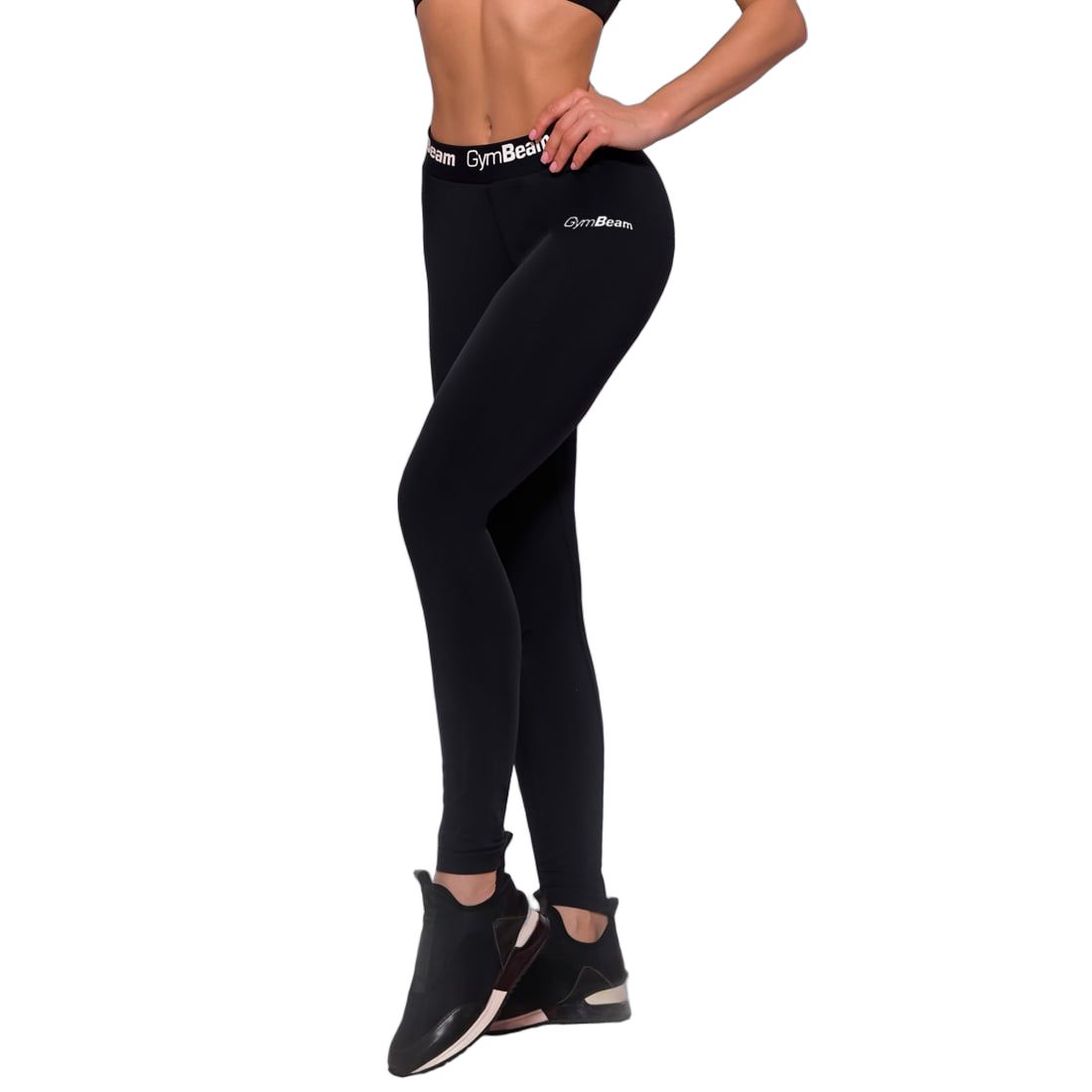 Frau in schwarzen Leggings und Sport-BH, Seitenansicht.