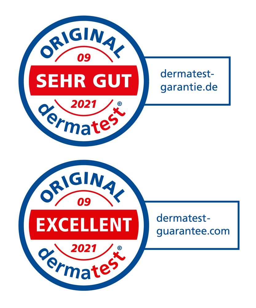 Zwei runde Siegel mit Text: "ORIGINAL", "SEHR GUT" und "EXCELLENT". Text: "dermatest-garantie.de" und "dermatest-guarantee.com".
