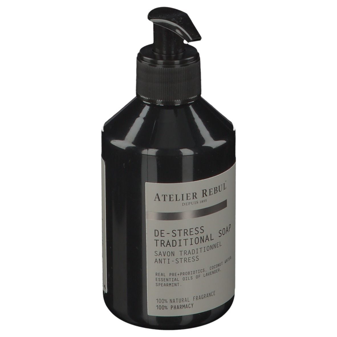 Schwarze Flasche mit Pumpe. Aufschrift: ATELIER REBUL, DE-STRESS TRADITIONAL SOAP. Enthält ätherische Öle.