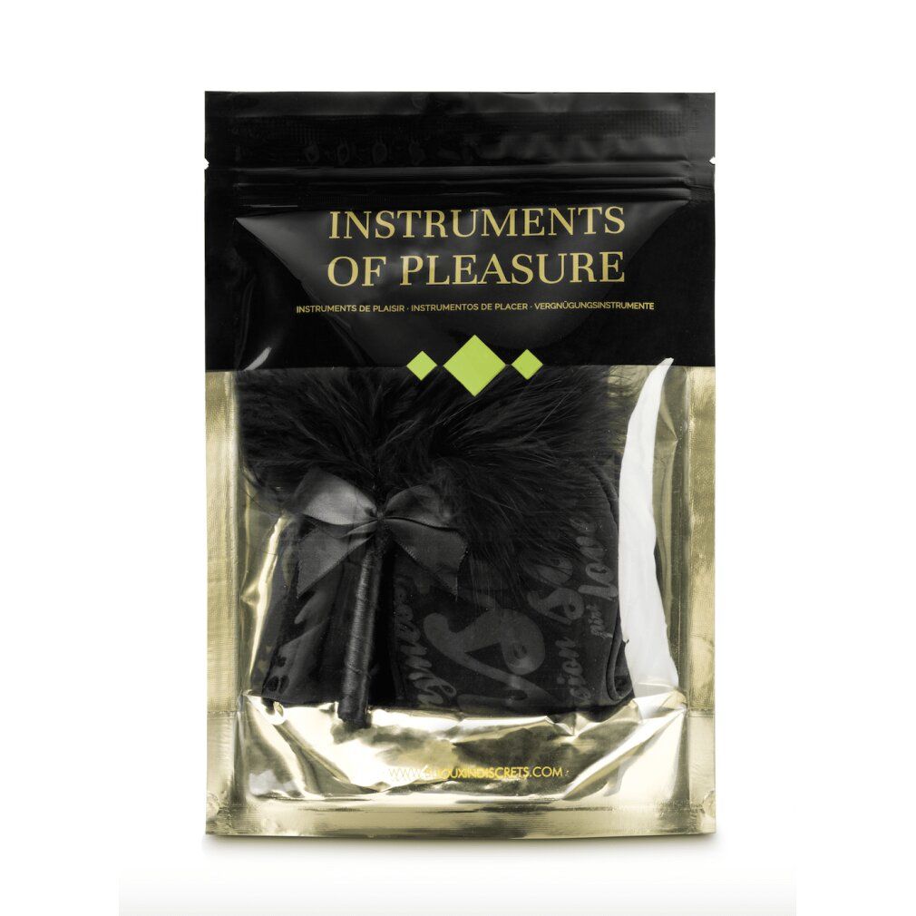 Schwarzes Feder-Accessoire mit Schleife in glänzender Verpackung.