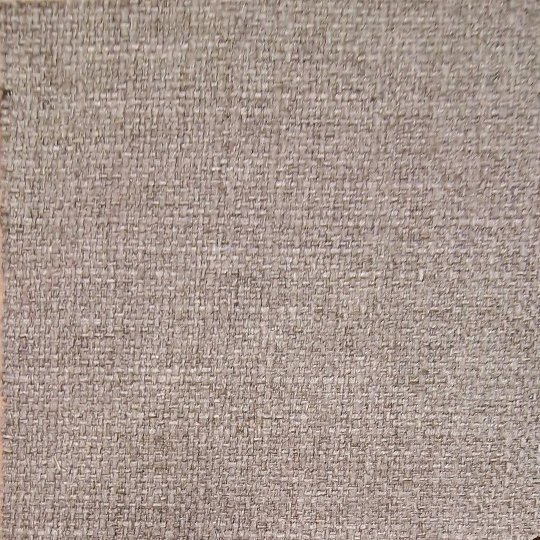 Nahaufnahme eines Stoffes in Beige. Die Textur ist grob gewebt.