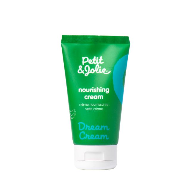 Grüne Tube mit weißem Verschluss. Aufschrift: Petit & Jolie, nourishing cream, Dream Cream. Mit Logo.
