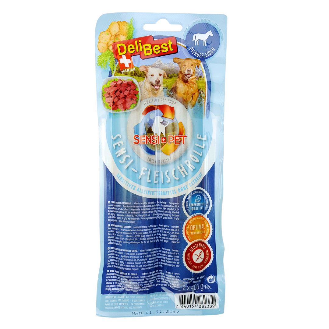 Verpackung mit Produkt. Oben links: Logo DeliBest. Mitte: Hunde und Produktabbildung. Text: Sensi-Fleischrolle. Siegel: Optima, Glutenfrei.