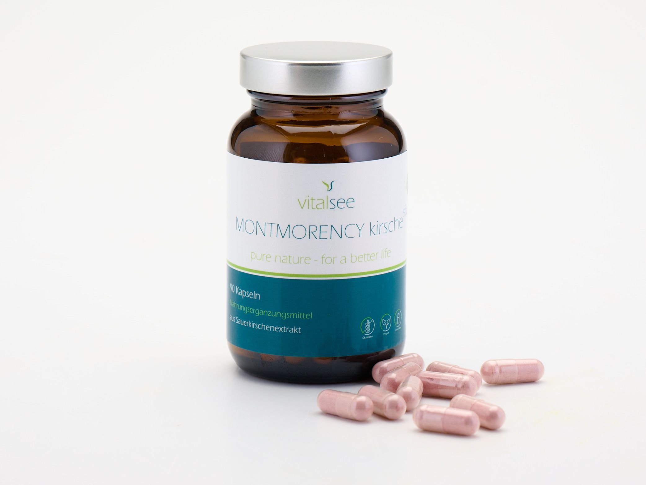 Braune Glasflasche mit silbernem Deckel und rosa Kapseln daneben. Produktname und Logo auf dem Etikett.