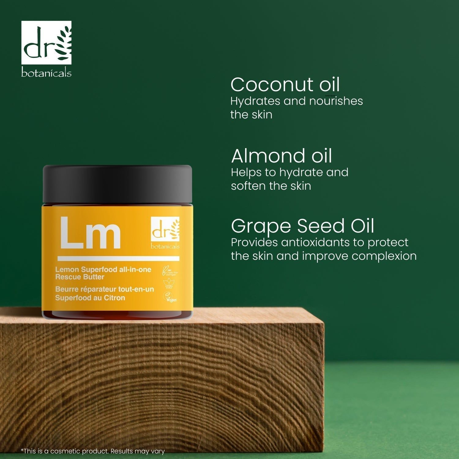 Gelber Tiegel mit "Lm" und "dr botanicals" auf Holzblock. Text: Lemon Superfood all-in-one Rescue Butter. Inhaltsstoffe: Kokos-, Mandel-, Traubenkernöl.