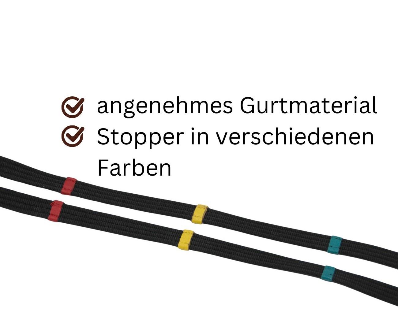 Nahaufnahme von schwarzen Reitlehrzügeln mit farbigen Stoppern. Rote, gelbe und blaue Akzente.