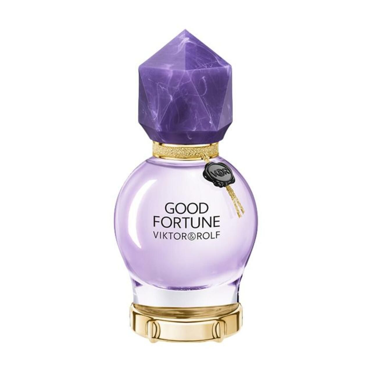 Runder, violetter Flakon mit Kristallverschluss. Goldener Ring am Hals. Aufschrift: Good Fortune Viktor & Rolf.