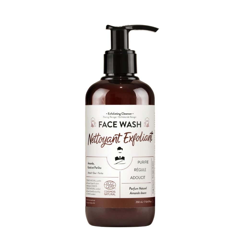 Braune Flasche mit schwarzem Pumpverschluss. Aufschrift: FACE WASH, Nettoyant Exfoliant. 250 ml.