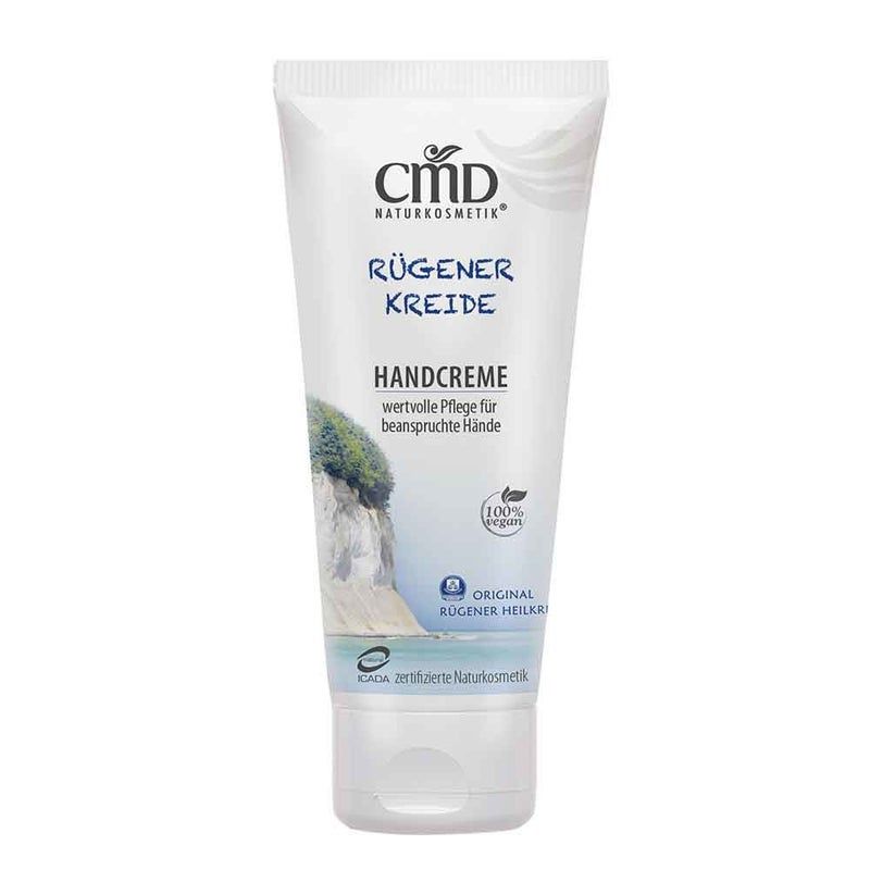 Weiße Tube CMD Handcreme mit blauem Schriftzug. Produktname: Rügener Kreide. Vegan-Siegel. Abbildung der Kreidefelsen.