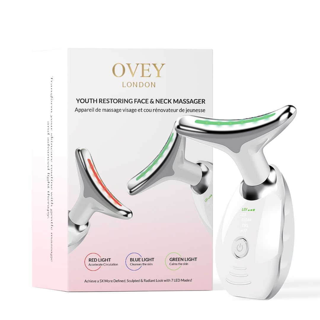 Produktverpackung mit Abbildung des Geräts. Gerät mit gebogenem Kopf, LED-Anzeige. Text: OVEY LONDON, Youth Restoring Face & Neck Massager.