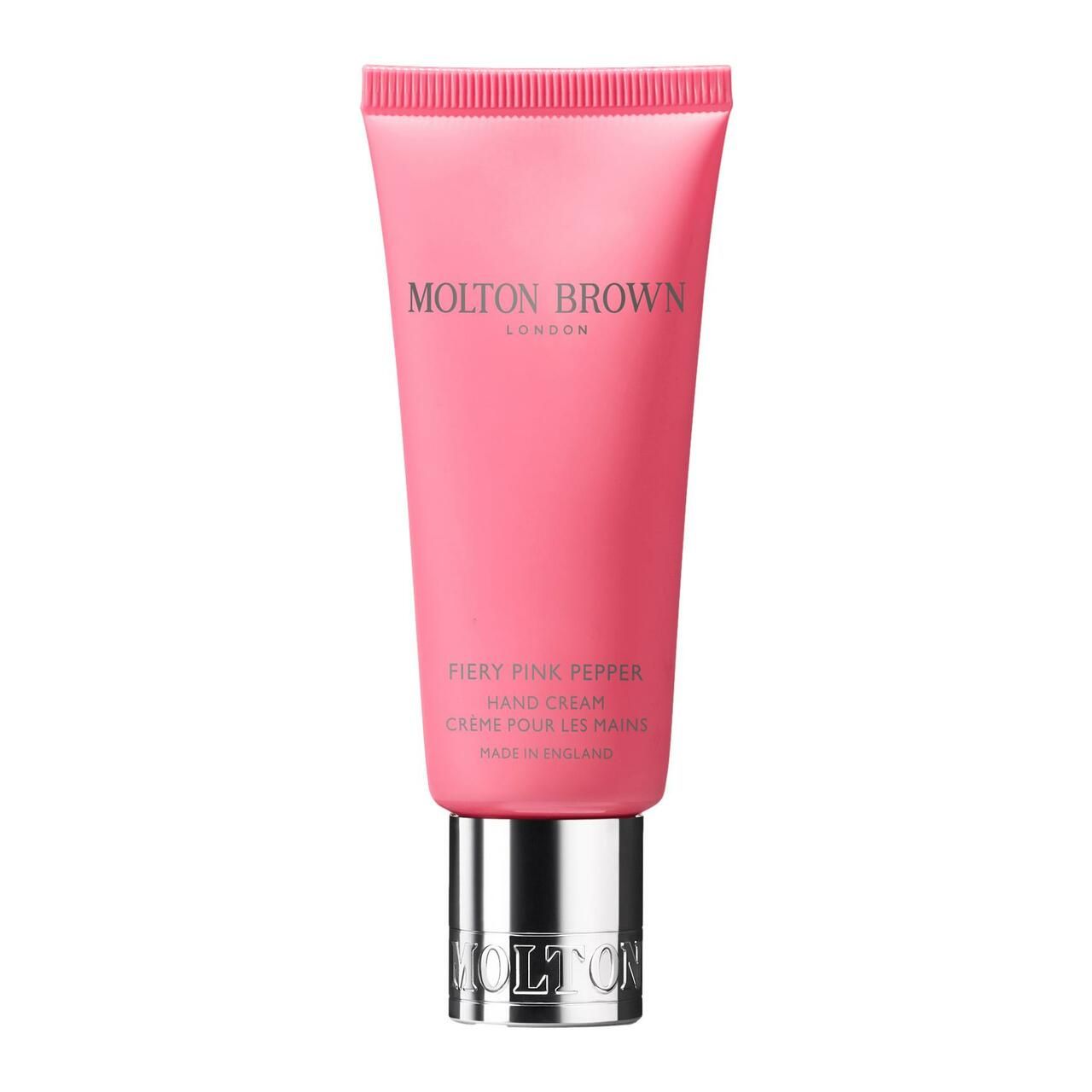 Eine rosa Tube Handcreme mit silbernem Verschluss und dem Molton Brown Logo.