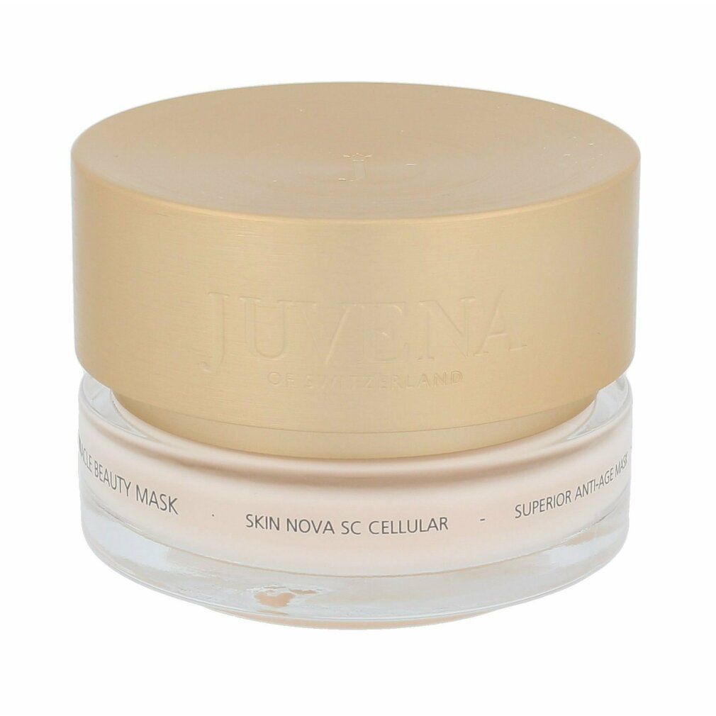 Behälter mit goldfarbenem Deckel. Aufschrift: Juvena of Switzerland. Produktname: Miracle Beauty Mask. Unterer Teil transparent.