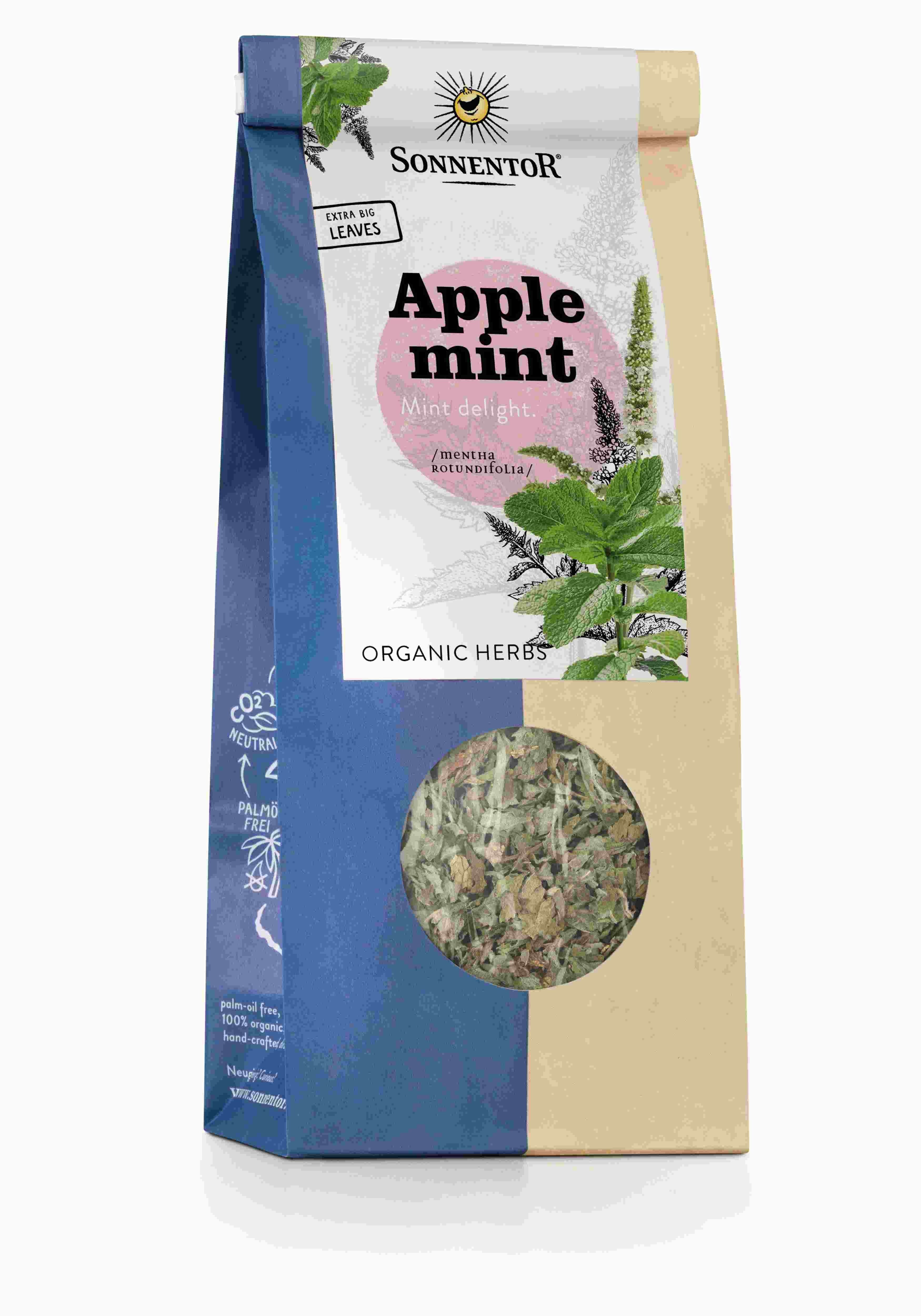 Beutel mit Apfelminze-Tee. Sichtfenster zeigt Kräuter. Marke SonnentoR. Aufschrift: Apple mint, Organic Herbs.