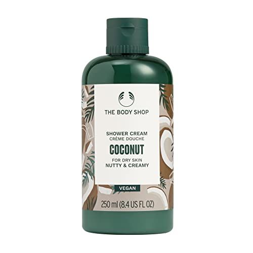 Grüne Flasche mit weißem Etikett. Aufschrift: The Body Shop, Coconut Shower Cream, vegan. 250 ml.