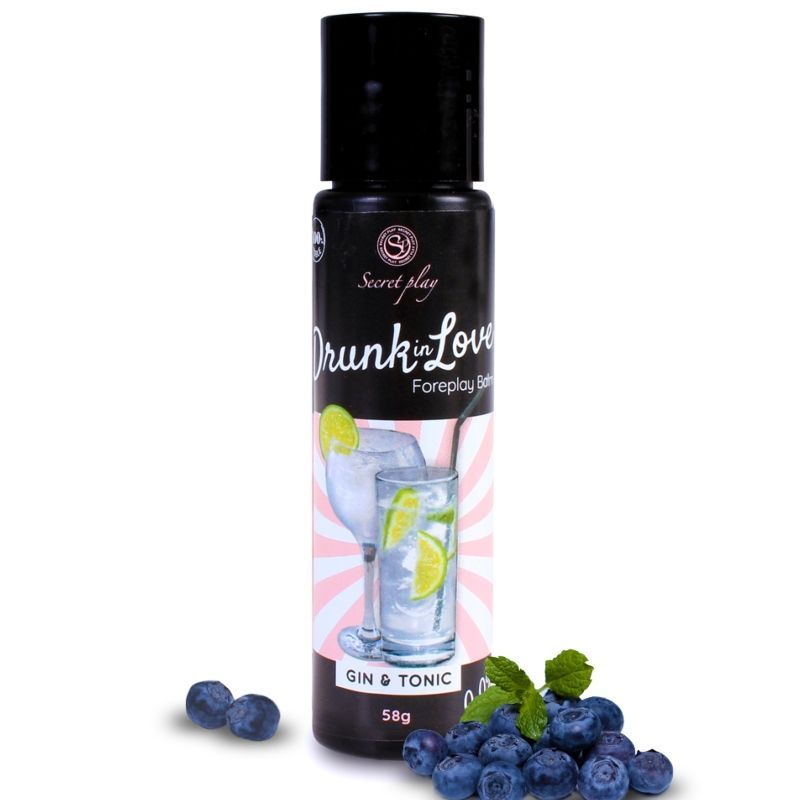 Flasche 'Drunk In Love' Balm mit Gin & Tonic, 58g, umgeben von Blaubeeren.