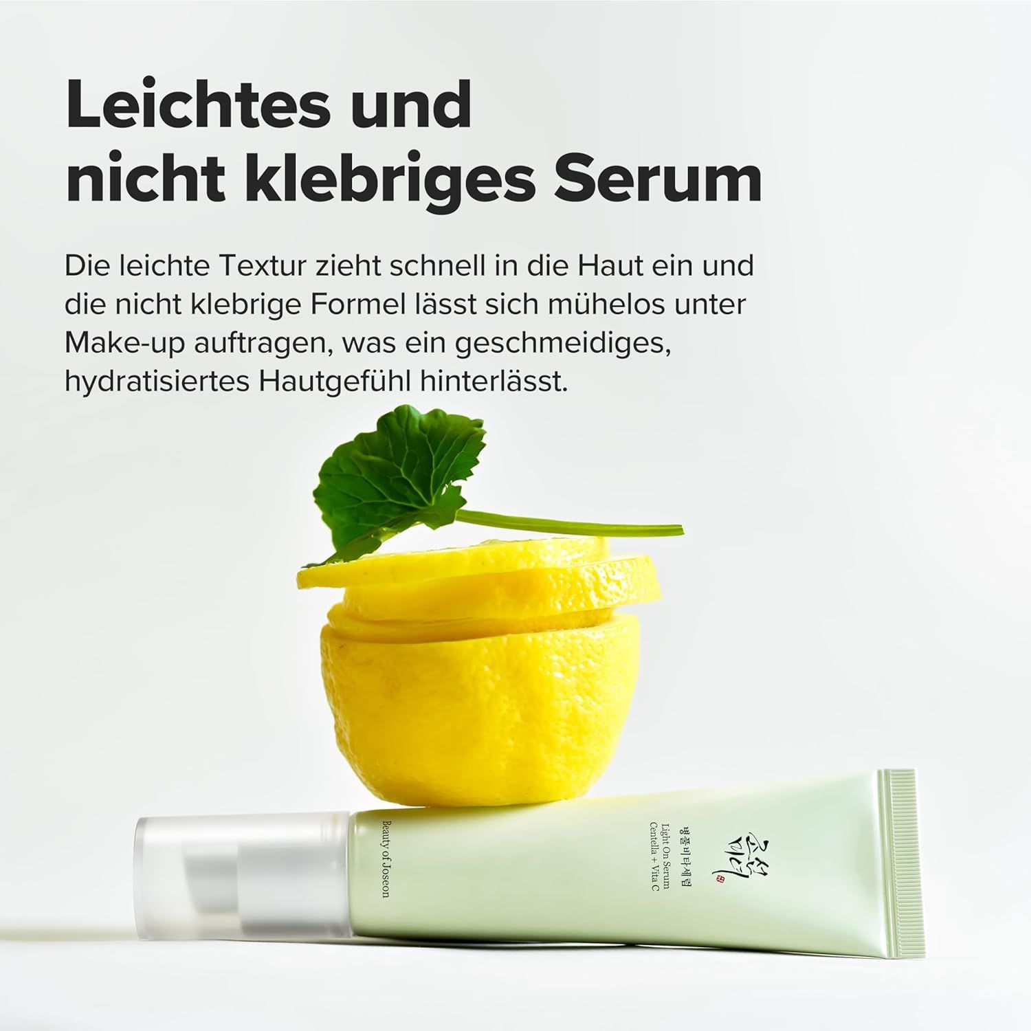 Serum-Tube neben Zitrone. Text: Leichtes und nicht klebriges Serum. Marke: Beauty of Joseon.