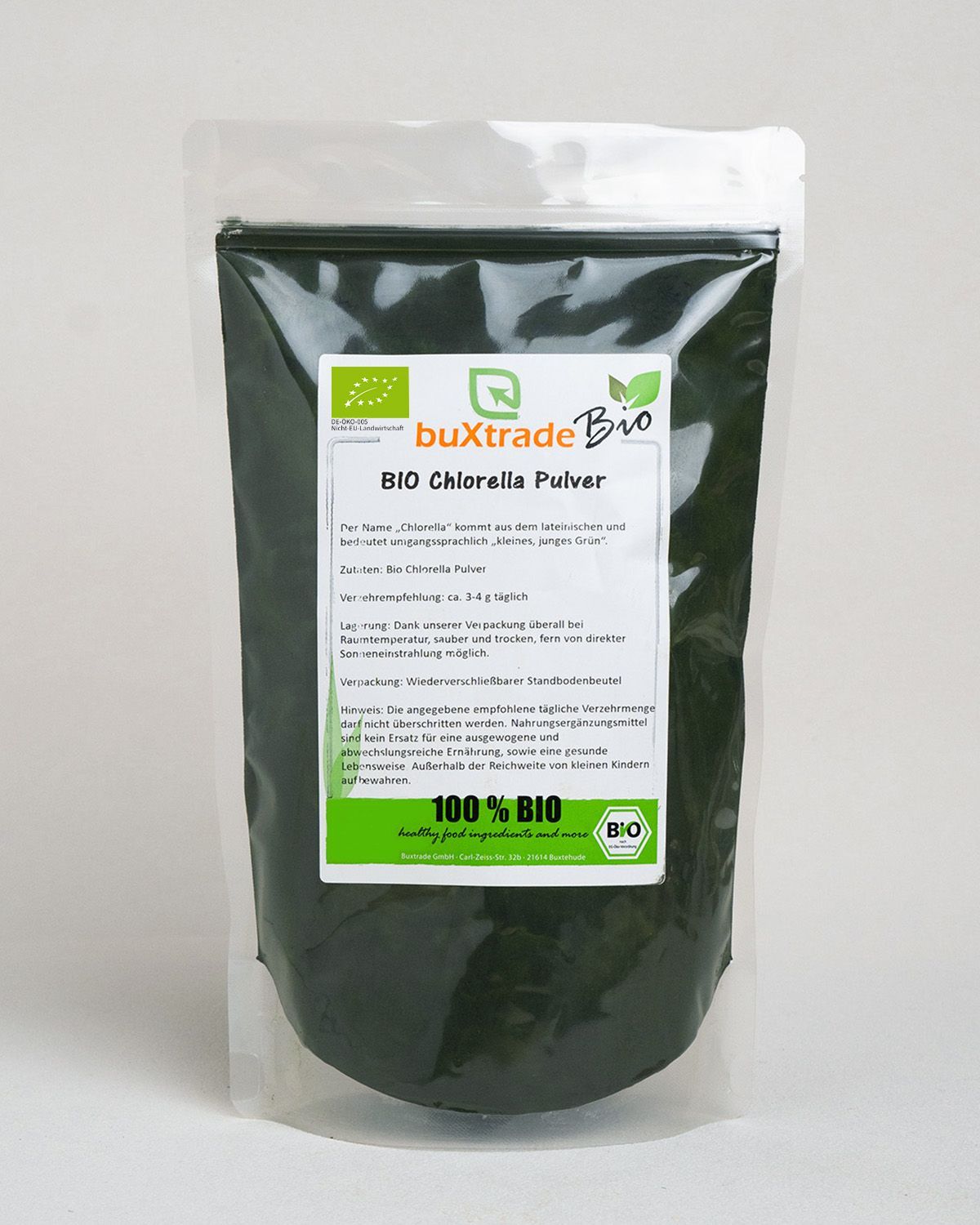 Verpackung von buXtrade Bio Chlorella Pulver mit Bio-Siegel und Produktinformationen.
