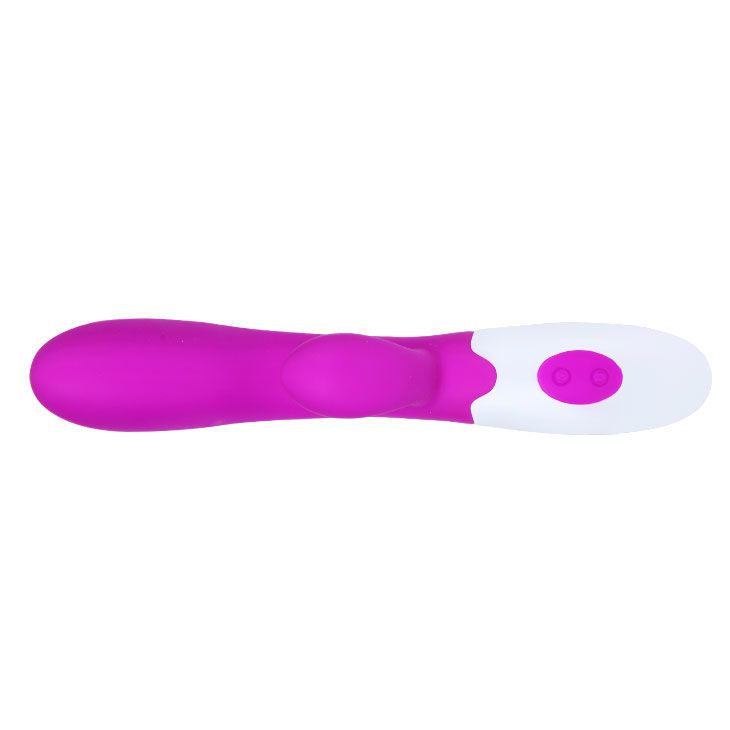 Lila Vibrator mit weißem Kopf. Zwei Knöpfe. Ergonomische Form. Aus Silikon.