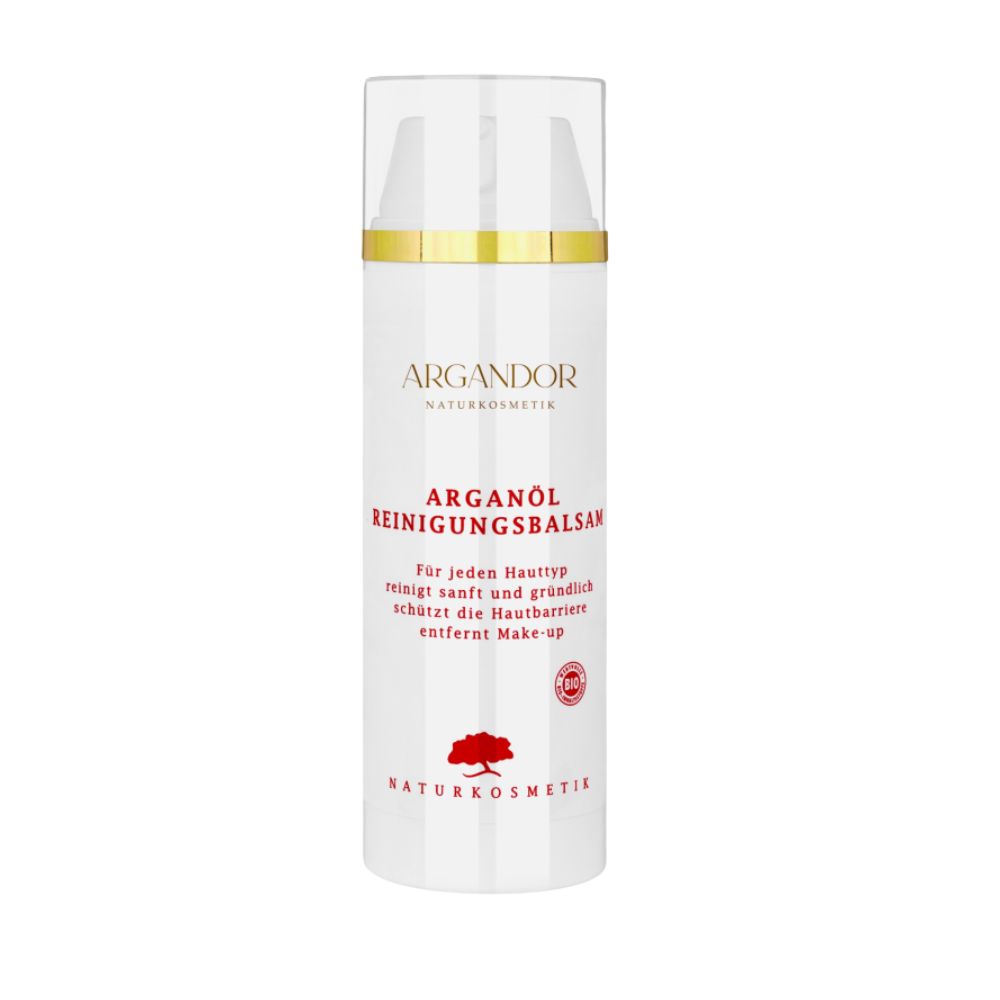Weißer Spender mit goldfarbenen Akzenten. Beschriftung: Argandor Naturkosmetik, Arganöl Reinigungsbalsam. Rotes Logo.