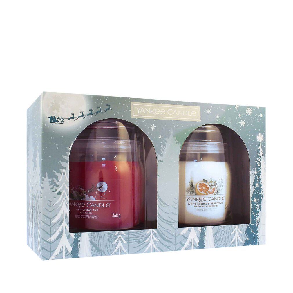 Geschenkset mit zwei Kerzen in Glasbehältern. Rote und cremefarbene Kerze in weihnachtlicher Verpackung. Marke Yankee Candle.