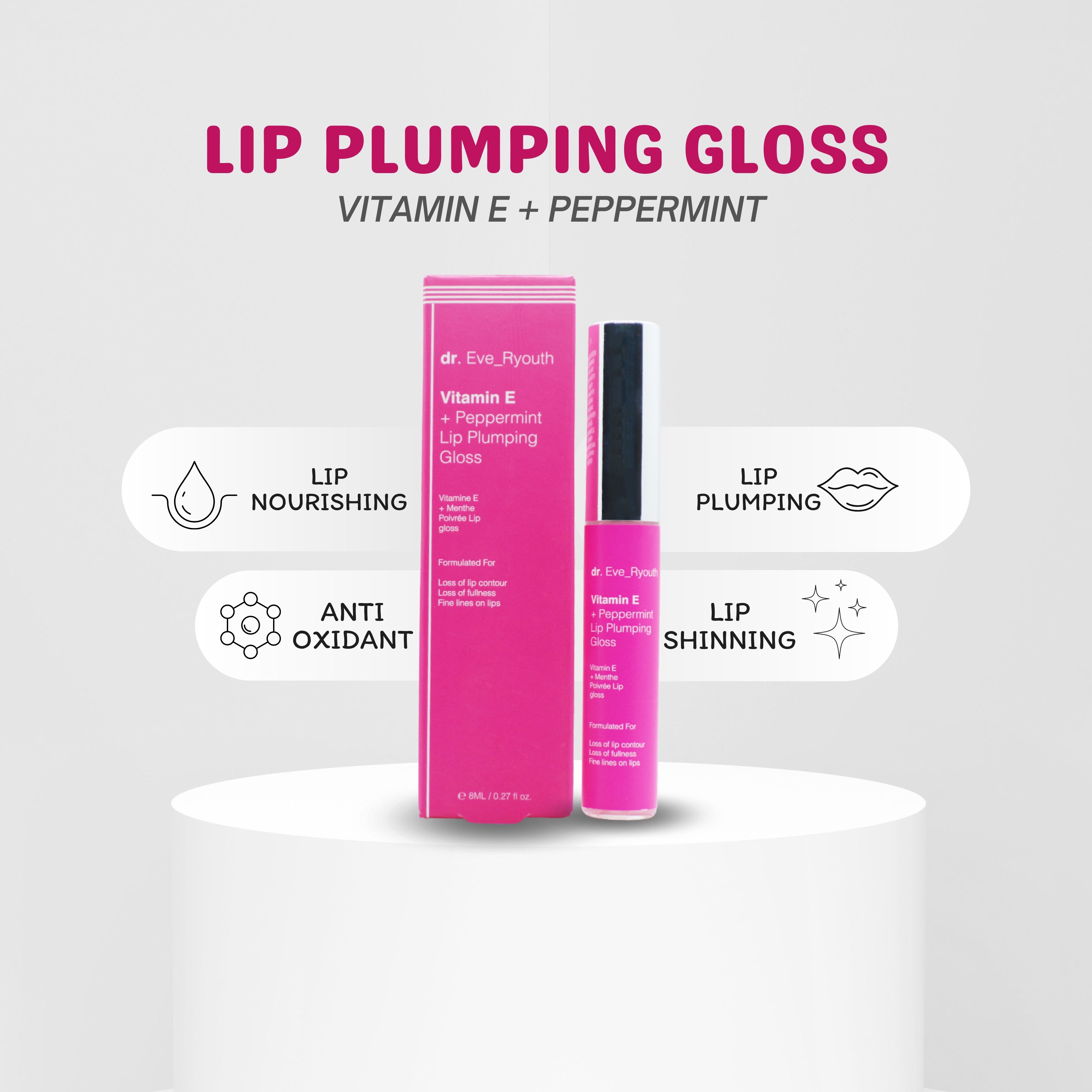 Rosa Verpackung und Lippen aufpolsternder Gloss. Beschriftung: Vitamin E + Pfefferminz. Produkt auf weißem Podest.