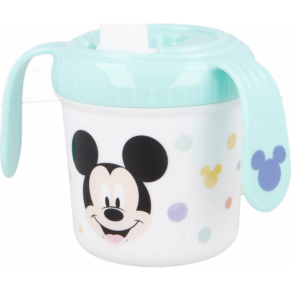 Weißer Trinkbecher mit Mickey Mouse-Motiv und hellblauem Deckel. Henkel und Ohren. Bunte Punkte als Designelemente.