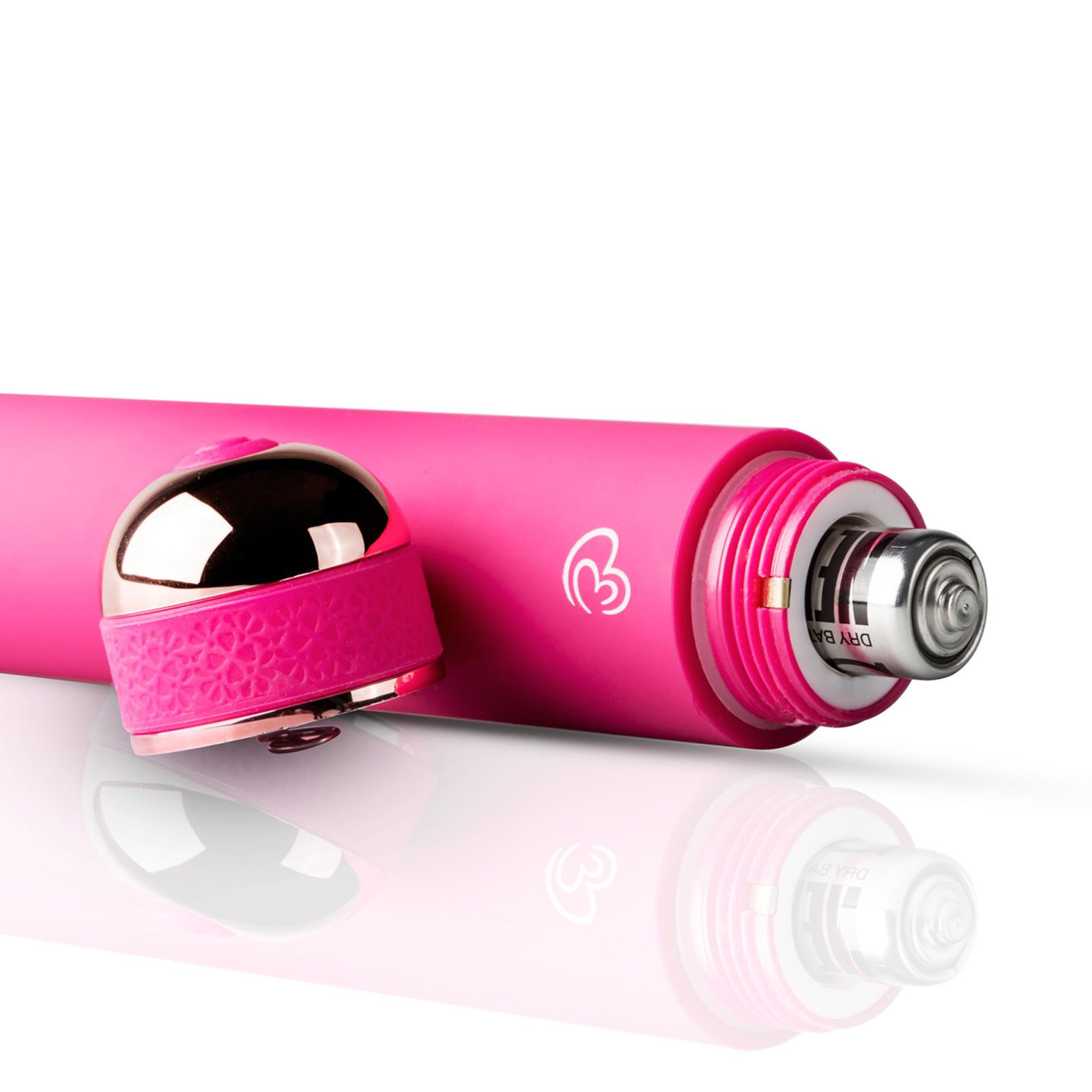Vibrator mit geöffnetem Batteriefach. Pinkfarben, goldfarbene Elemente. Batterie sichtbar.