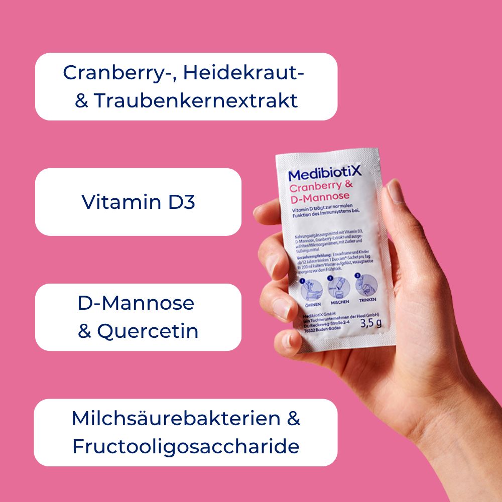 Hand hält ein Päckchen "MedibiotiX Cranberry & D-Mannose". Text: Cranberry-, Heidekraut- & Traubenkernextrakt, Vitamin D3, D-Mannose & Quercetin.