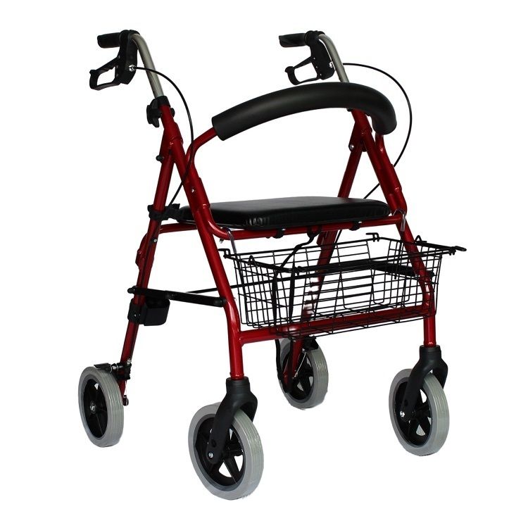 Rotfarbener Rollator mit Korb und Stockhalterung. Vier Räder, Sitzfläche und Handgriffe. Schwarze Bremsen.