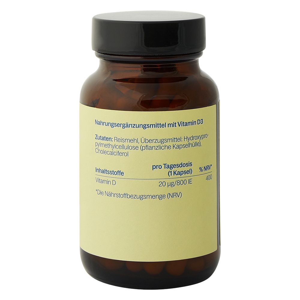 Braune Glasflasche mit schwarzem Deckel. Etikett mit Nährwertangaben für Vitamin D3. Zutatenliste und Dosierung.