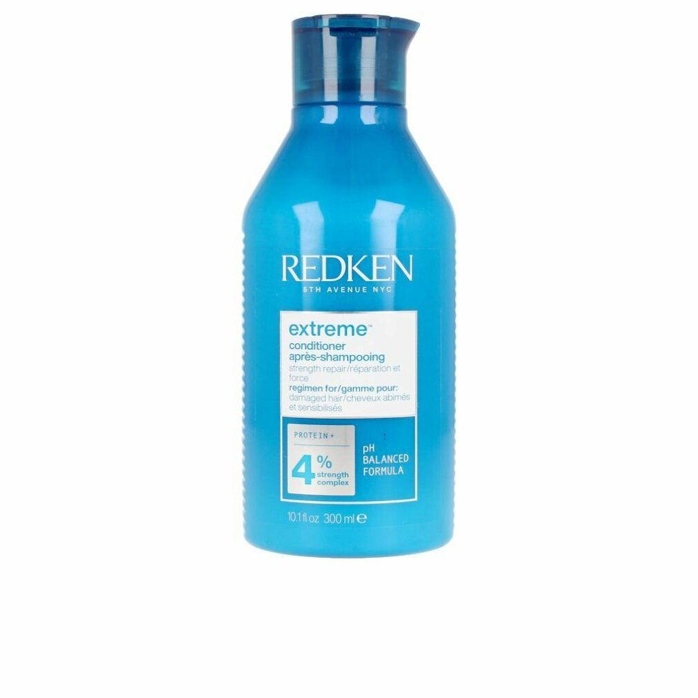Blaue Flasche Redken Extreme Conditioner. Enthält 300 ml. Aufschrift: Extreme, pH Balanced Formula, 4% Strength Complex.