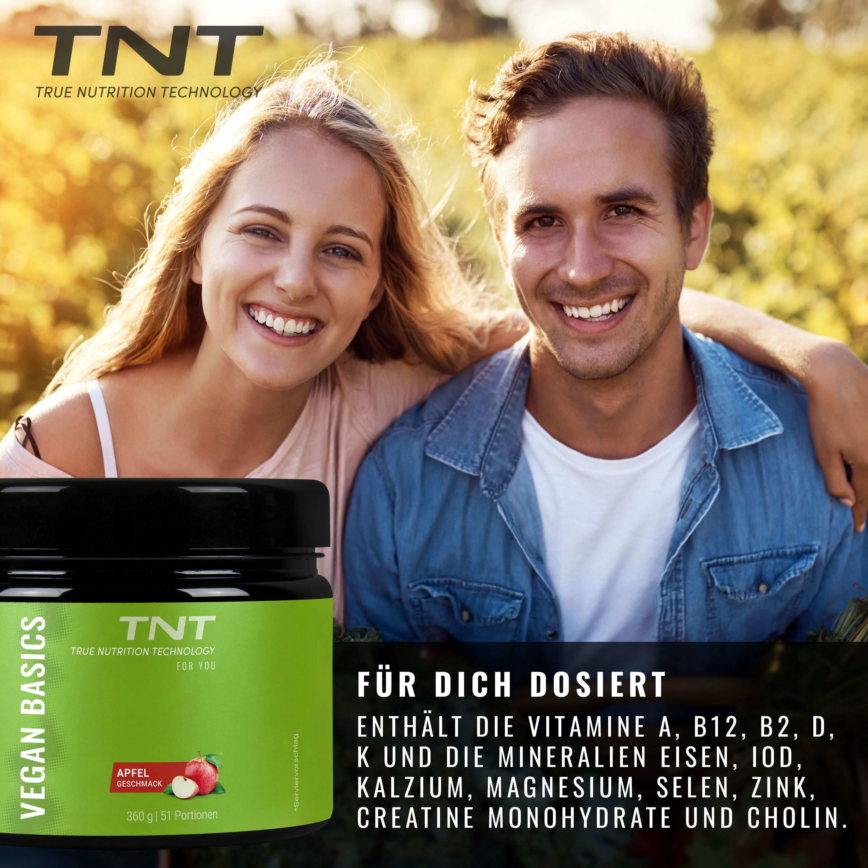 Paar lächelt, hält Dose TNT Vegan Basics. Text: Enthält Vitamine, Mineralien, Eisen, Jod, Kalzium, Magnesium, Selen, Zink, Creatine.