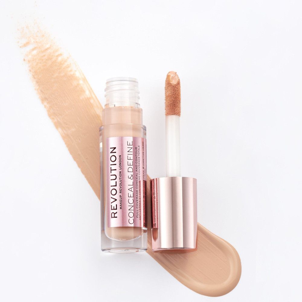 Concealer-Fläschchen mit Applikator. Rosa-goldene Kappe, transparente Flasche. Produktname sichtbar.