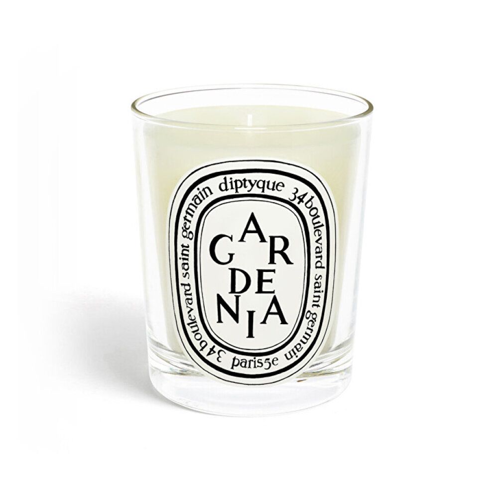 Kerze GARDENIA in Glas. Schwarzes Etikett mit Logo. Weißes Wachs. Klarer Glasbehälter.