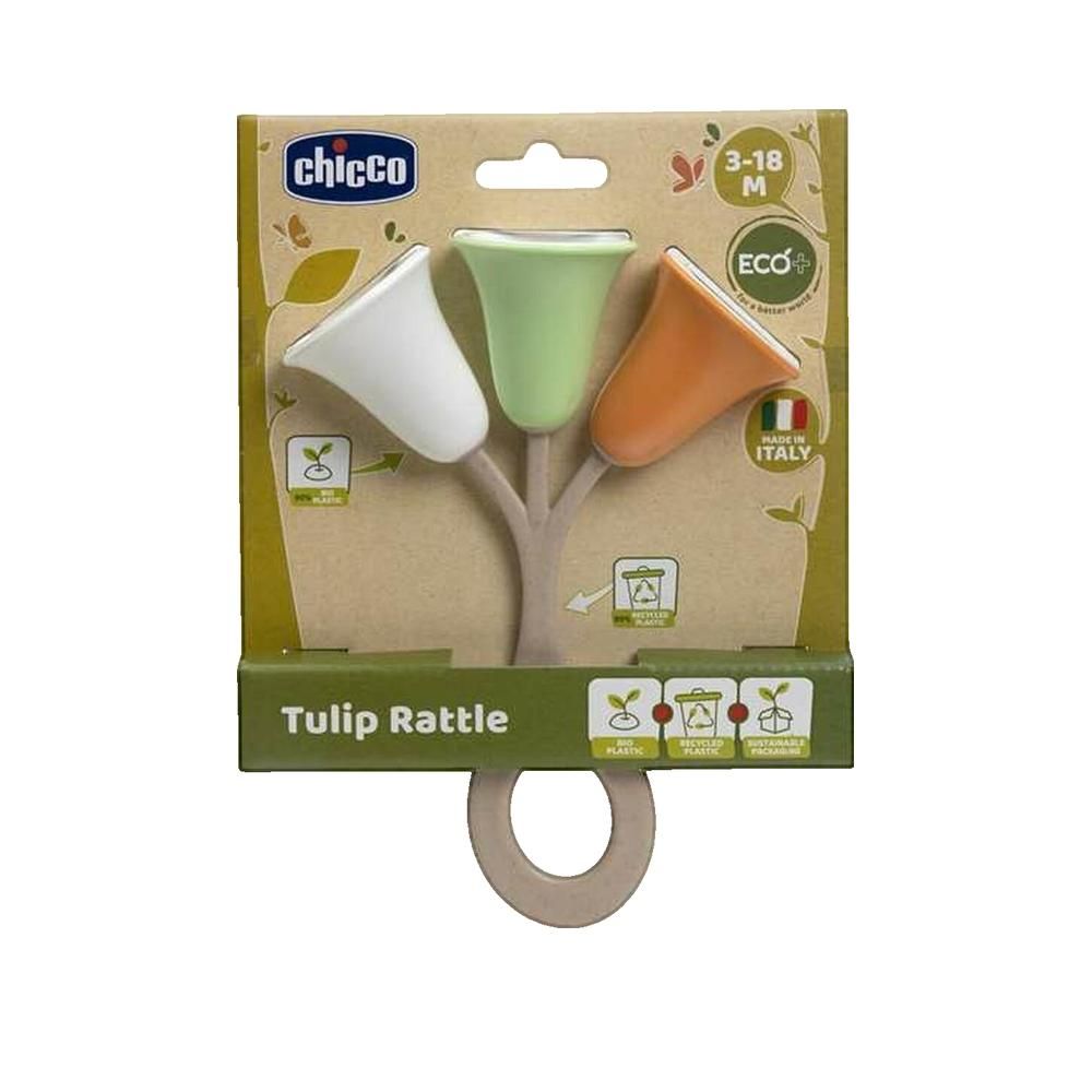 Rassel mit drei tulpenförmigen Elementen in Weiß, Grün und Orange. Verpackung mit Logo und Altersangabe. Hergestellt in Italien.